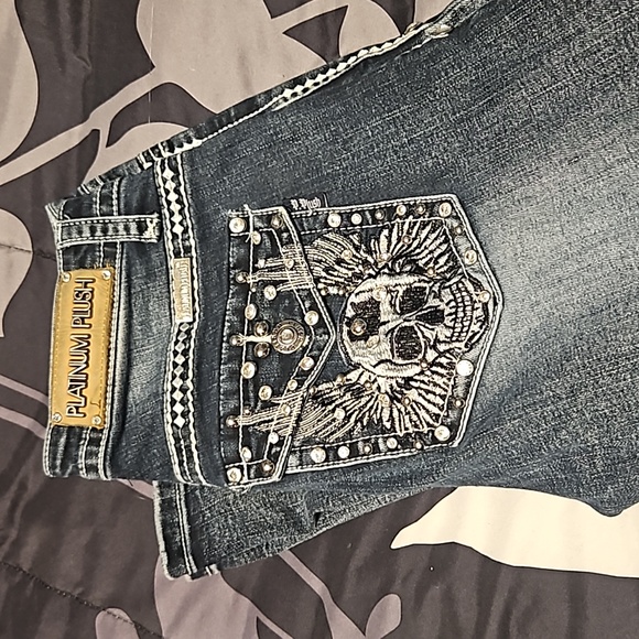 A pair of boot-cut  Platinum Plush jeans - Picture 9 of 11